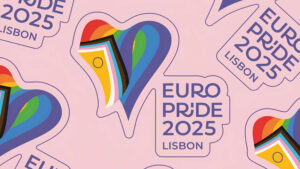 Imagem com um fundo é rosa-claro, com um coração estilizado formado por várias cores e faixas representando a diversidade da comunidade LGBTI+, com texto Europride 2025 Lisbon